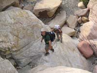 07-Chris_scrambling_up_First_Creek