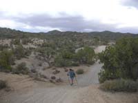 94-darker_clouds_looming-Eric_on_road