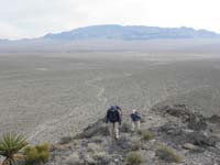 04-Ed_and_Luba_on_ridgeline-looking_back_towards_Hwy_95,Corn_Creek,Sheep_Mountains