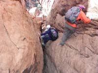 32-group_being_careful_heading_down_into_slot_canyon