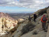 45-group_with_Las_Vegas_Strip_in_distance-many_people_below_took_easy_way_to_saddle_from_Sandstone_Quarry