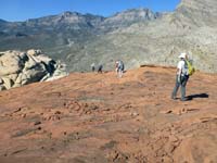 37-group_heading_down_slab_to_reach_trail-from_Jim