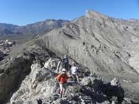 47-group_on_jagged_ridgeline_with_Turtlehead_in_background