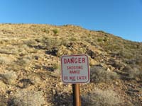 33-only_saw_two_signs_along_fence_warning_about_gun_range