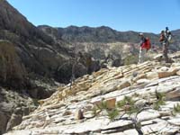 38-Ed_and_Luba_starting_to_go_down-view_looking_back_from_peak