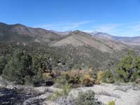 34-scenic_view_from_top_of_ridge_above_La_Madre_Mine,Cabin,Spring-looking_NW-scorched_terrain.fire