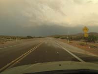 46-1755pm-same_road_open-dark_clouds_in_distance