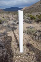19-PVC_post_in_concrete-checked_with_Jim_Boone_to_learn_an_illegal_mining_claim-take_it_down