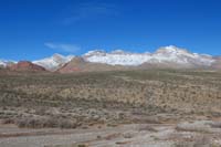 01-scenic_snowy_peaks_from_Red_Rock_sign_on_Hwy_159