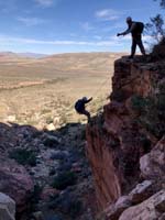 81-Kent_rappelling_while_I'm_leaning_over_the_edge_to_photo_him-from_Laszlo