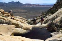 34-group_passing_by_a_watering_hole