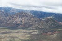46-view_from_summit-looking_E-zoom_of_White_Rock_Pk,Snoopy's_Nose_in_background_shrouded_in_clouds