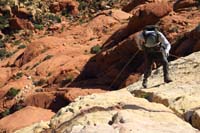 22-Ed_rappelling,Richard_at_bottom_of_200_foot_rappel