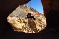 30-Luba_rappelling_with_Richard_pulling_her_into_cave_using_extra_rope