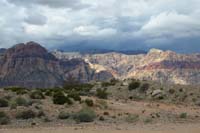 53-scenic_view_with_sun_peaking_out_of_the_clouds_with_approaching_storm
