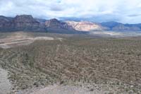 54-view_on_tailings_pile_of_Midas_and_Outer_Loop_trails_and_Red_Rock_scenery