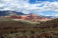 62-pretty_vibrant_Calico_Hills_illuminated_by_the_sun_peaking_through_the_clouds