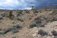 143-Excavator_Trail_offers_challenging_jump_for_mountain_bikers-storm_getting_darker,closer