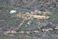 25-zoom_view_of_old_homestead_and_someone_living_there_in_RV