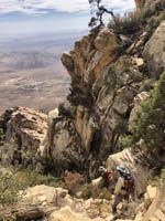 35-me_and_Mike_scrambling_down_steep_terrain-from_Brett
