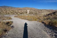 28-looking_back_to_trail_which_turns_to_R,not_dirt_road_ahead-continue_to_Outer_Limit_S_TJ