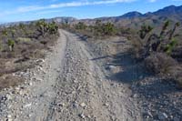 55-dirt_road_continues_while_Top_Gun_Brake_Burner_is_to_right
