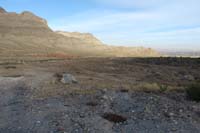42-now_to_stroll_through_terraformed_section_on_the_way_to_a_paved_road_to_be_picked_up,2.7_miles