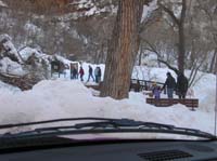 42-people_hiking_up_the_ice_covered_trail_to_Weeping_Rock