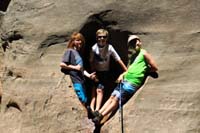 18-Nick,Kenny,Justin_hanging_out_in_a_little_cave