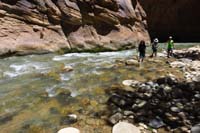32-Daddy_caught_up_to_them-looking_back_at_kids_hiking_up_river