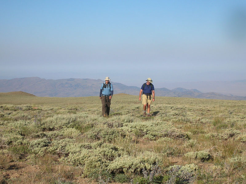 13-Jose_and_Joel_hiking_through_the_sagebrush_and_grass