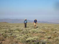 13-Jose_and_Joel_hiking_through_the_sagebrush_and_grass