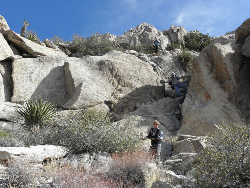 62-group_climbing_down_the_terrain