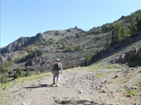 09-me_on_trail_with_tower_in_distance-from_Joel