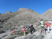 02-group_leaving_dirt_road-heading_up_wash_to_left