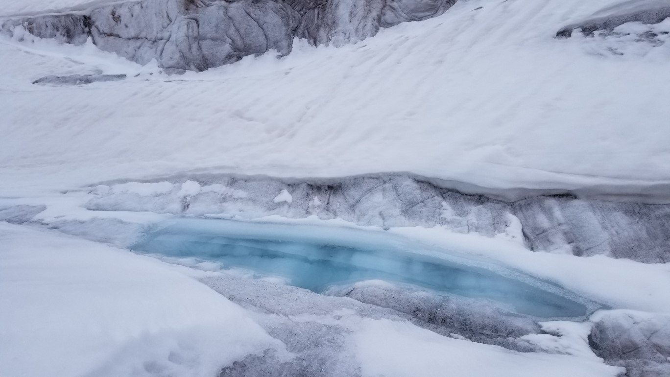 078-frozen_small_pool_of_glacial_blue_ice